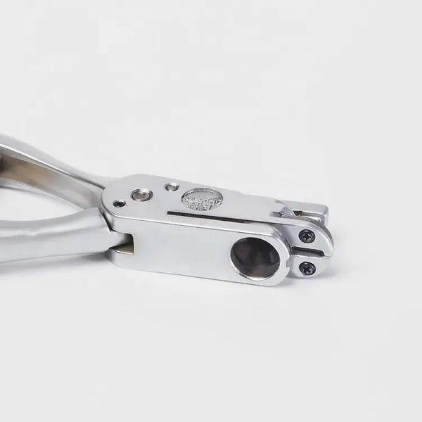 Pince a Cranter et perforateur MULTIUSAGE en acier .